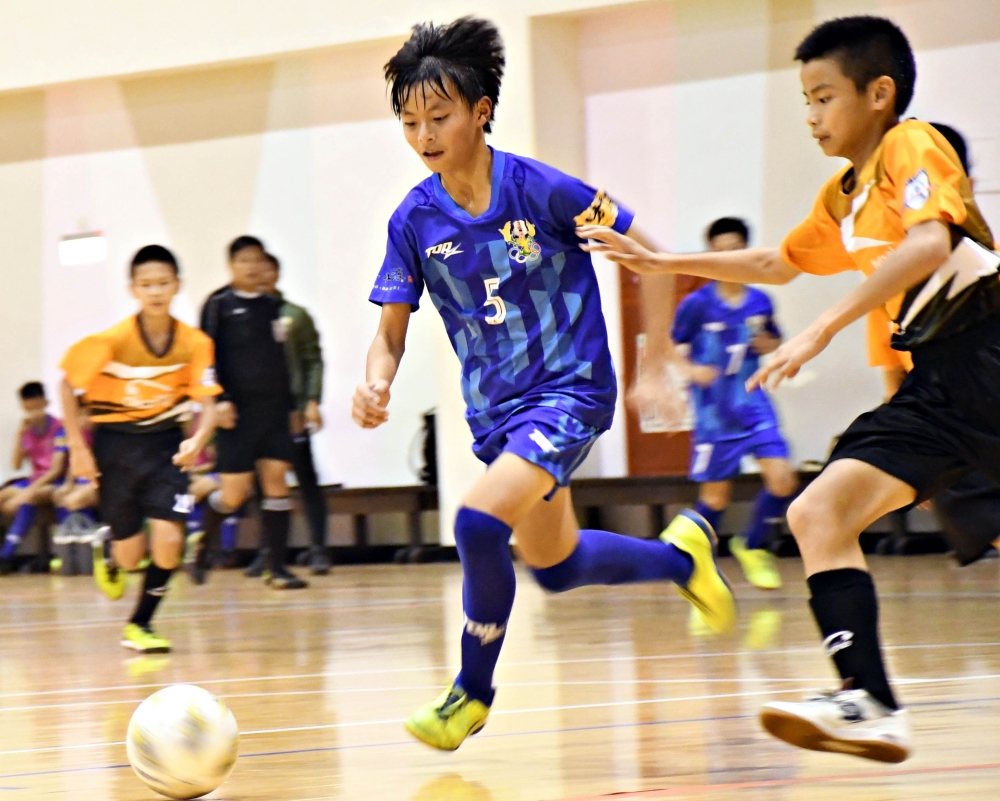 蘆洲國小和Okane FC爭冠。足球協會提供。下同。