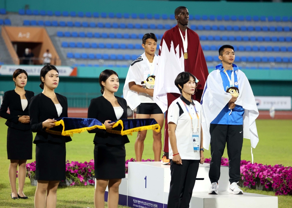 陳政安（右）在亞青田徑賽400公尺決賽奪銅。林嘉欣／攝影。