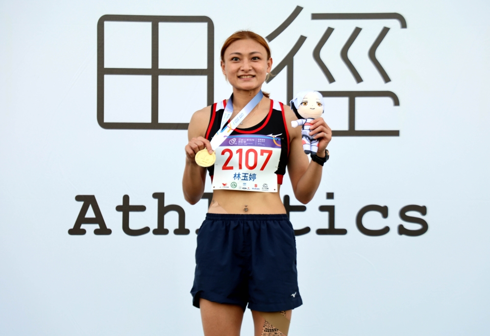 大一才練三級跳的林玉婷13.31躍第三傑續拚破全國。林嘉欣／攝影。