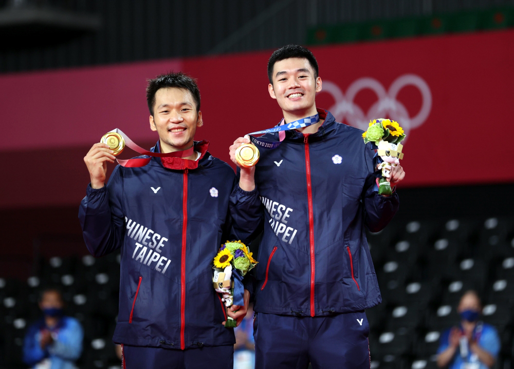 東京奧運羽球金牌李洋和王齊麟。體育署提供。