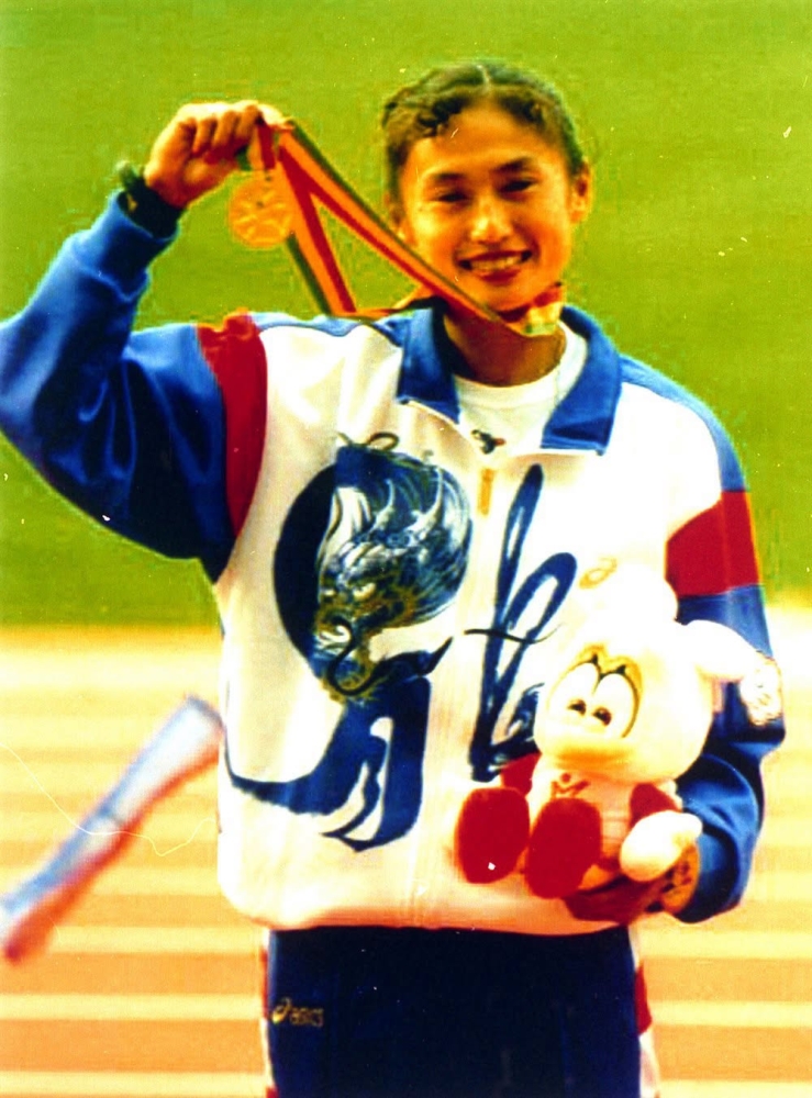 1994年日本廣島亞運，「風速女王」王惠珍在女子200公尺摘金破亞運。 圖片來源：體育運動文化數位典藏平台。