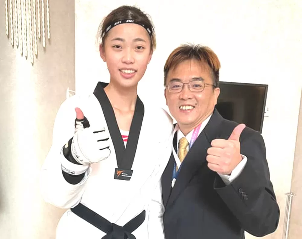 中華跆拳道隊羅嘉翎和教練劉聰達。劉聰達/提供。