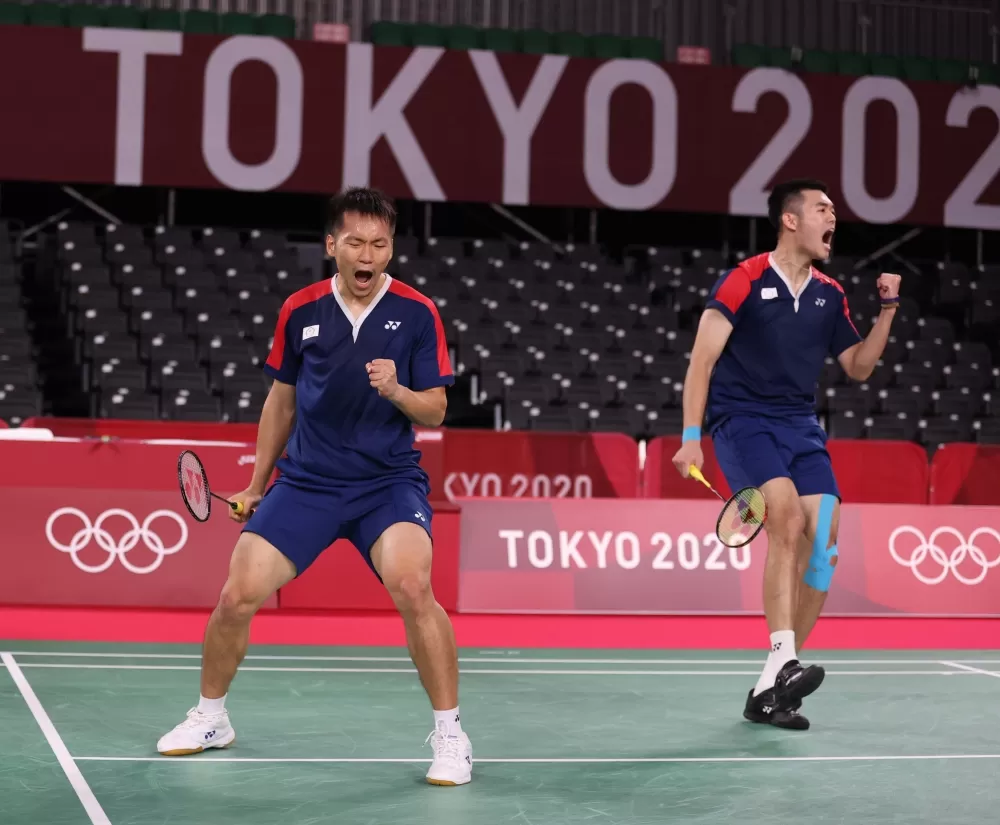 「黃金男雙」王齊麟/李洋奪小組賽首勝。體育署提供。