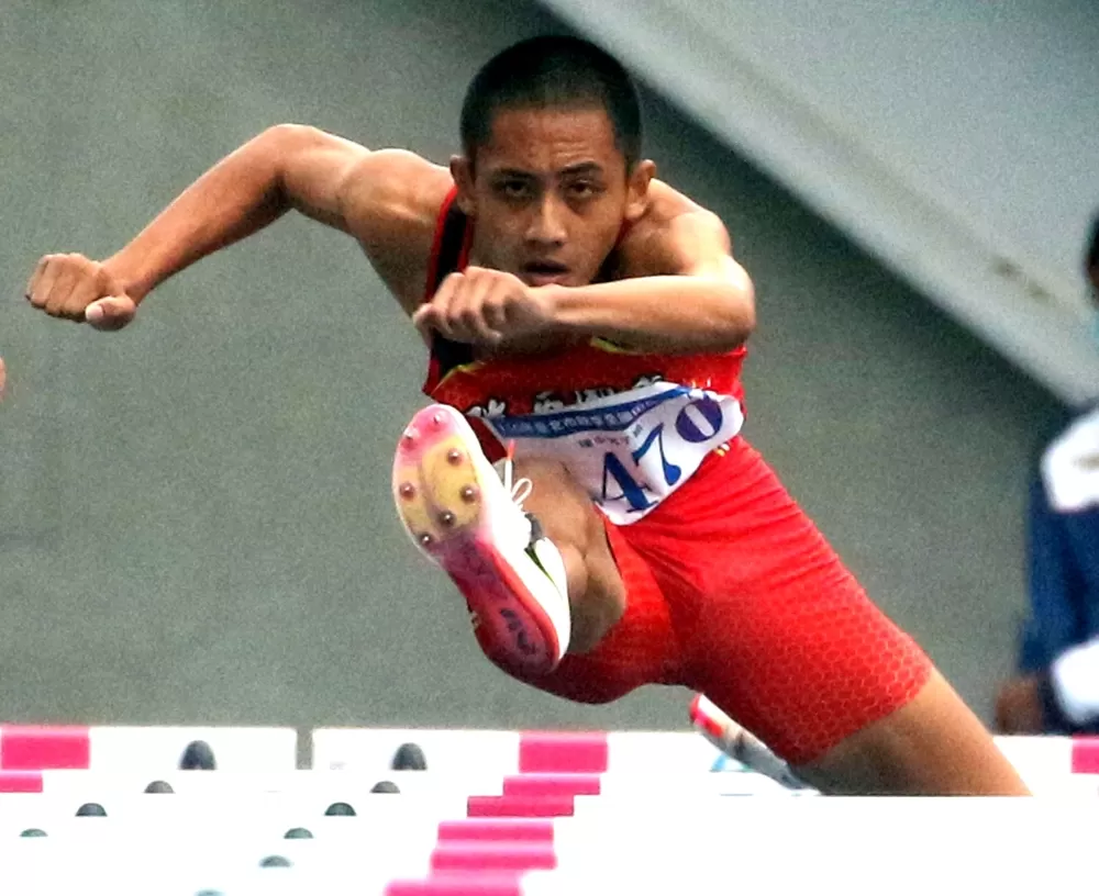 「阿寶」吳育廷破國男110公尺跨欄大會紀錄。林嘉欣/攝影。