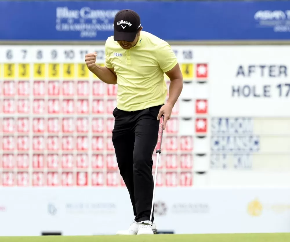 詹世昌第18洞推桿奪冠剎那開心握拳慶賀。