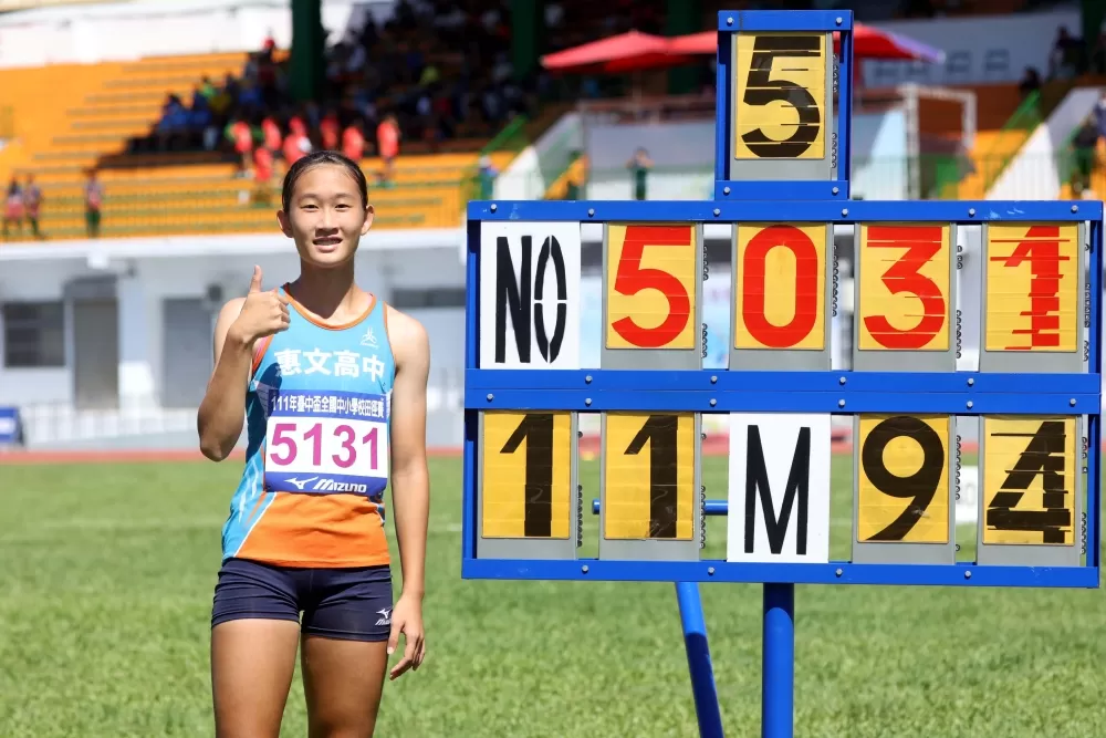 惠文高中「學霸」張羽萱三級跳遠破大會。林嘉欣／攝影。