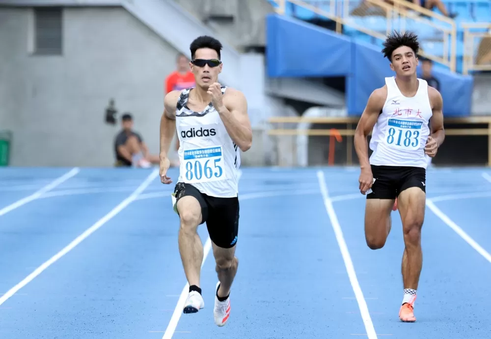 楊俊瀚（前）200公尺再破大會奪雙金。林嘉欣／攝影。
