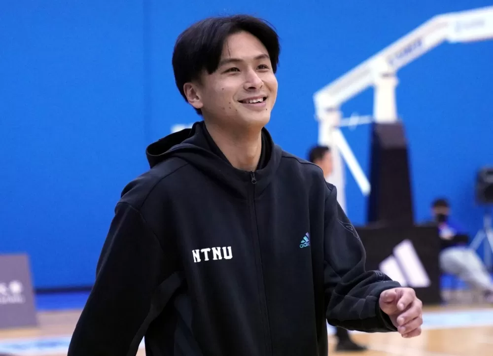 臺灣師大1分險勝臺灣體大，教練李秉鴻賽後展露笑顏。