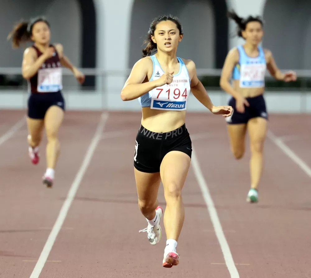 張秝羚（中）破大會。林嘉欣／攝影。