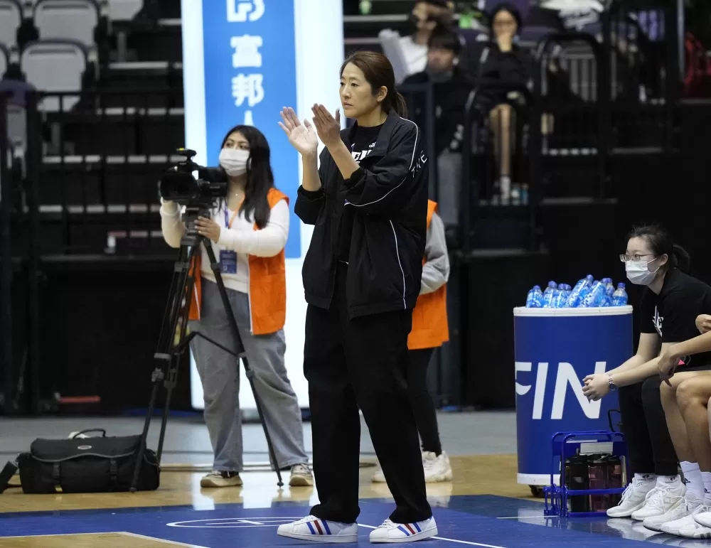 文化大學教練鄭慧芸。