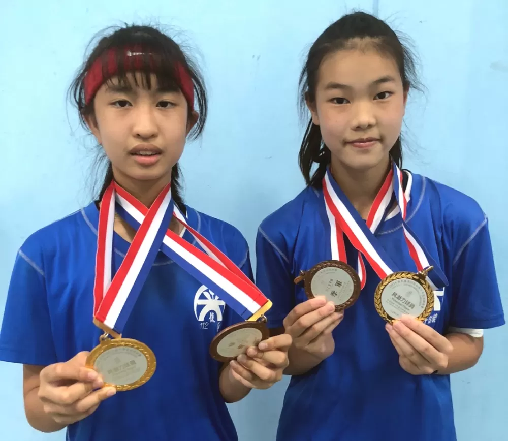 光復「雙一姊」秦綺穎（左）、許喆縈。