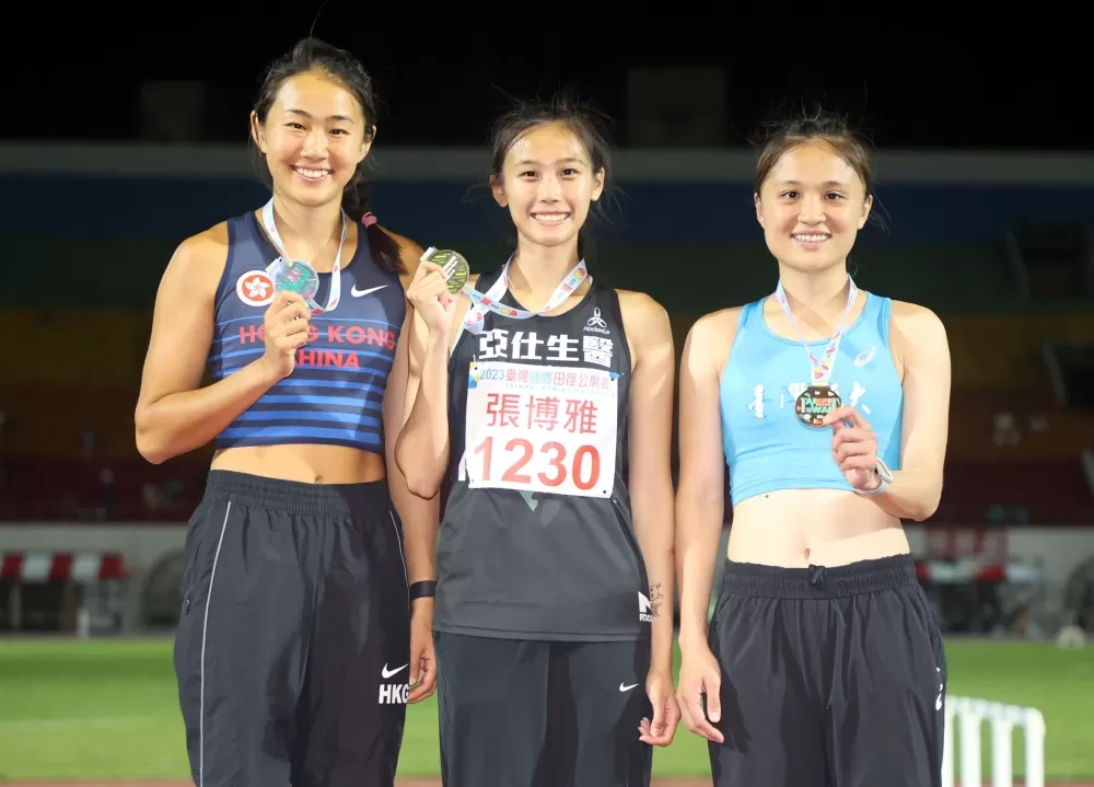  女子一百公尺跨欄前三名。林嘉欣／攝影。