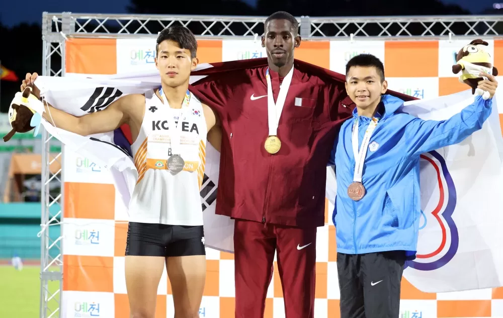 陳政安（右）在亞青田徑賽400公尺決賽奪銅。林嘉欣／攝影。
