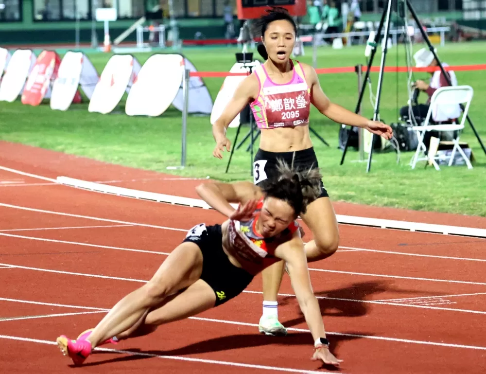 女子一百公尺決賽。林嘉欣/攝影。