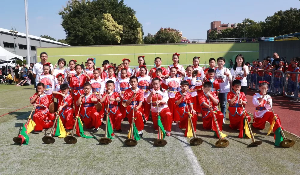 金門中正國小哨角隊完成九連霸，可以快閃去吃麥當勞和肯德基（臺南大學提供）。